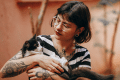 what is the best way to hold a cat?