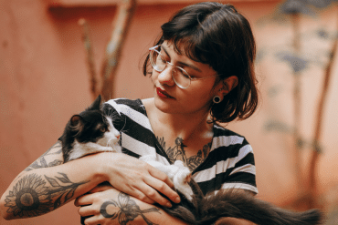 what is the best way to hold a cat?