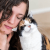 why does my cat headbutt me?